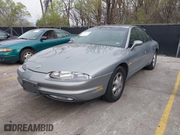 1995 Oldsmobile Aurora with VIN 1G3GR52C2S4100055, listed as a IAAI auction lot 41918157 with 106,329 mi miles and . Bid and sale history available at DreamBid. Image 2.