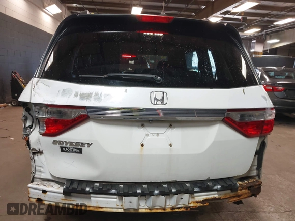 2013 Honda Odyssey EX-L with VIN 5FNRL5H66DB071151, listed as a IAAI auction lot 41914345 with 194,804 mi miles and . Bid and sale history available at carsss.com. Image 6.