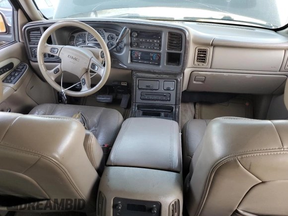 2005 GMC Sierra Denali z VIN 2GTEK63N051303155, wystawiony jako Copart lot #73654884 z przebiegiem Nie podano mil oraz Szkody całkowita. Historia ofert i sprzedaży dostępna na DreamBid. Obrazek 8.