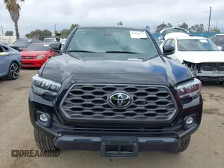 2023 Toyota Tacoma SR z VIN 3TMCZ5AN4PM548729, wystawiony jako IAAI lot #42078723 z przebiegiem 30 966 mil mil oraz . Historia ofert i sprzedaży dostępna na DreamBid. Obrazek 11.
