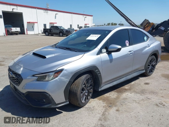 2022 Subaru WRX Premium with VIN JF1VBAF62N9028683, listed as a IAAI auction lot 42227871 with 21,234 mi miles and . Bid and sale history available at DreamBid. Image 2.