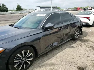 2024 Honda Civic EX z VIN 2HGFE1F76RH319547, wystawiony jako Copart lot #54358805 z przebiegiem 12 143 mil mil oraz Szkoda całkowita • Salvage title. Historia ofert i sprzedaży dostępna na DreamBid. Obrazek 13.