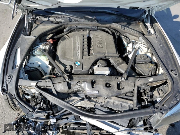 2016 BMW 5 Series 535i xDrive with VIN WBA5B3C55GG260630, listed as a Copart auction lot 58806995 with 72,028 mi miles and Salvage title. Bid and sale history available at DreamBid. Image 11.