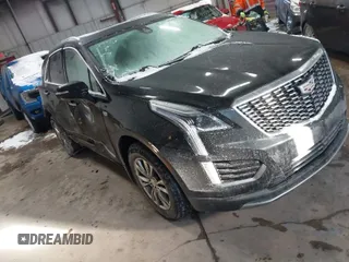 2021 Cadillac XT5 FWD Premium Luxury with VIN 1GYKNCRS3MZ198651, listed as a IAAI auction lot 41607734 with 49,275 mi miles. Bid and sale history available at carsss.com. Image 1.