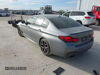2023 BMW 5 Series 530i xDrive with VIN WBA13BJ04PCL98504, listed as a IAAI auction lot 41702411 with 27,830 mi miles and . Bid and sale history available at DreamBid. Image 3.