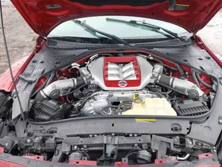 2015 Nissan GT-R Premium z VIN JN1AR5EFXFM280227, wystawiony jako IAAI lot #41920650 z przebiegiem 79 140 mil mil oraz . Historia ofert i sprzedaży dostępna na DreamBid. Obrazek 10.