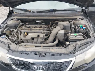 2012 Kia Forte EX with VIN KNAFU4A28C5490102, listed as a IAAI auction lot 42164395 with 167,444 mi miles. Bid and sale history available at carsss.com. Image 10.