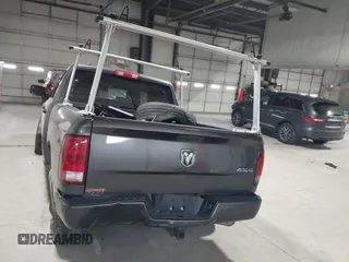2018 Ram 1500 Express z VIN 1C6RR7KG2JS277259, wystawiony jako IAAI lot #40986520 z przebiegiem 63 916 mil mil oraz . Historia ofert i sprzedaży dostępna na DreamBid. Obrazek 16.