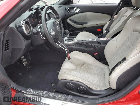 2009 Nissan 370Z z VIN JN1AZ44E19M400603, wystawiony jako Copart lot #79878474 z przebiegiem 129 976 mil mil oraz Szkoda całkowita • Salvage title. Historia ofert i sprzedaży dostępna na DreamBid. Obrazek 7.