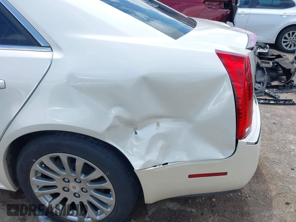2012 Cadillac CTS Performance z VIN 1G6DK5E34C0116367, wystawiony jako IAAI lot #42373255 z przebiegiem 93 444 mil mil oraz . Historia ofert i sprzedaży dostępna na DreamBid. Obrazek 6.