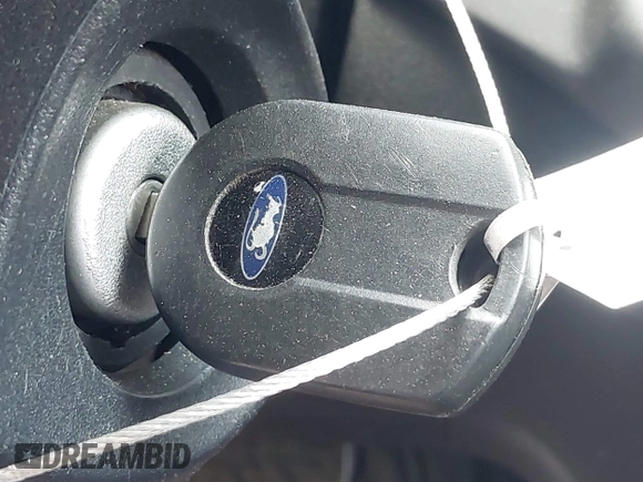 2014 Ford Escape SE z VIN 1FMCU9GX1EUD66666, wystawiony jako IAAI lot #42571222 z przebiegiem Nie podano mil oraz . Historia ofert i sprzedaży dostępna na DreamBid. Obrazek 11.