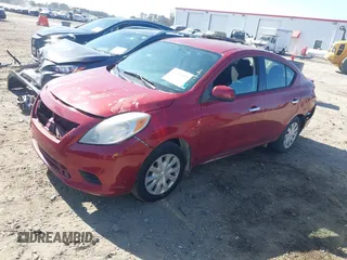 2014 Nissan Versa SV with VIN 3N1CN7AP6EK462276, listed as a IAAI auction lot 41533459 with 138,719 mi miles. Bid and sale history available at carsss.com. Image 2.
