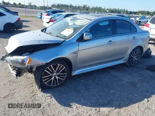 2017 Mitsubishi Lancer ES with VIN JA32V2FW1HU000481, listed as a IAAI auction lot 41316272 with 107,115 mi miles. Bid and sale history available at carsss.com. Image 2.
