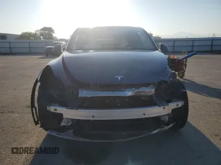 2023 Tesla Model Y Long Range with VIN 7SAYGDEE7PA146322, listed as a Copart auction lot 54071165 with 38,334 mi miles and Salvage Title. Bid and sale history available at DreamBid. Image 5.