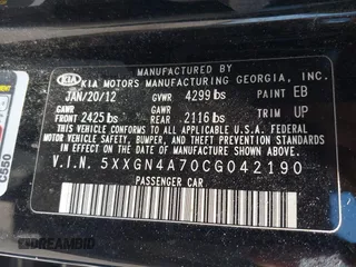 2012 Kia Optima EX with VIN 5XXGN4A70CG042190, listed as a IAAI auction lot 42003619 with 189,622 mi miles. Bid and sale history available at carsss.com. Image 9.