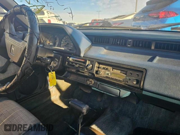 1984 Honda Civic z VIN JHMAH3321ES036981, wystawiony jako Copart lot #82262604 z przebiegiem 122 778 mil mil oraz Tytuł czysty. Historia ofert i sprzedaży dostępna na DreamBid. Obrazek 9.