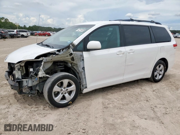 2014 Toyota Sienna LE AAS with VIN 5TDKK3DC1ES424249, listed as a Copart auction lot 62114525 with 193,301 mi miles and Salvage title. Bid and sale history available at DreamBid. Image 1.