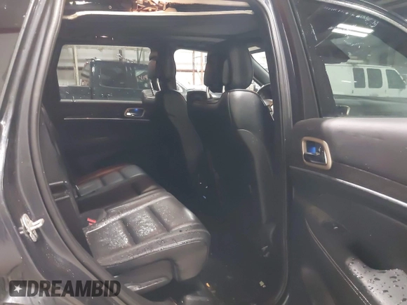 2014 Jeep Grand Cherokee Overland with VIN 1C4RJFCT9EC234270, listed as a IAAI auction lot 41938621 with 144,541 mi miles and . Bid and sale history available at DreamBid. Image 8.