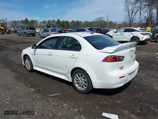 2010 Mitsubishi Lancer ES with VIN JA32U2FU9AU027824, listed as a IAAI auction lot 41992311 with 239,422 mi miles. Bid and sale history available at carsss.com. Image 3.