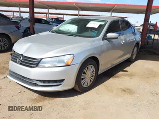 2015 Volkswagen Passat 1.8T Wolfsburg Ed with VIN 1VWAT7A31FC028990, listed as a IAAI auction lot 41778229 with 73,553 mi miles. Bid and sale history available at carsss.com. Image 2.