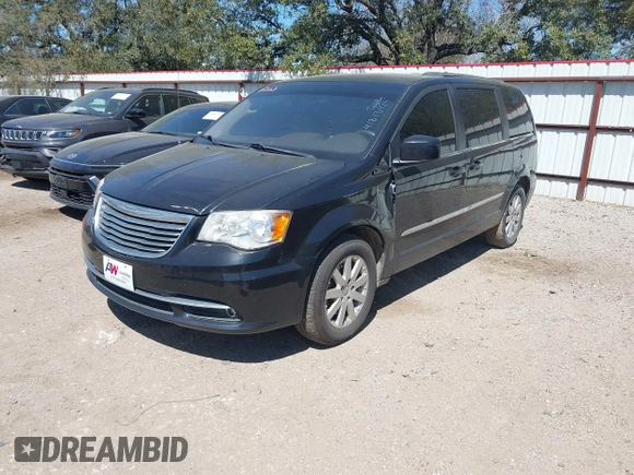 2013 Chrysler Town & Country Touring with VIN 2C4RC1BGXER216837, listed as a IAAI auction lot 41813424 with 216,395 mi miles and . Bid and sale history available at DreamBid. Image 2.