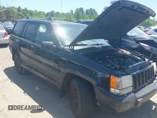 1997 Jeep Grand Cherokee Laredo z VIN 1J4GZ58S3VC508194, wystawiony jako IAAI lot #42578622 z przebiegiem 146 559 mil mil oraz . Historia ofert i sprzedaży dostępna na DreamBid. Obrazek 1.
