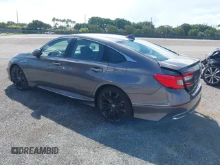 2022 Honda Accord Touring with VIN 1HGCV3F91NA031010, listed as a IAAI auction lot 40302407 with 18,820 mi miles and . Bid and sale history available at DreamBid. Image 3.