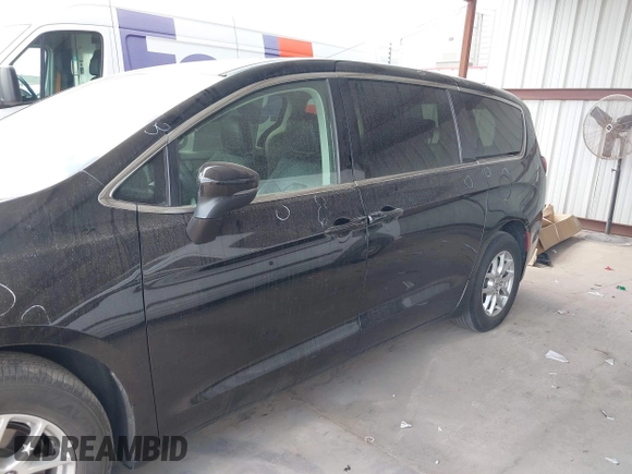2023 Chrysler Pacifica Touring L with VIN 2C4RC1BG1PR550628, listed as a IAAI auction lot 42553430 with 61,773 mi miles and . Bid and sale history available at DreamBid. Image 15.
