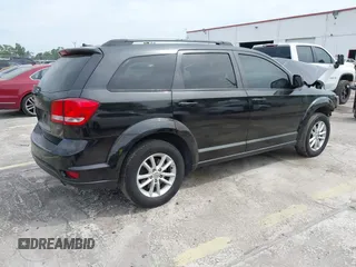 2015 Dodge Journey SXT with VIN 3C4PDCBB3FT577121, listed as a IAAI auction lot 41855712 with Not Provided miles and . Bid and sale history available at DreamBid. Image 4.