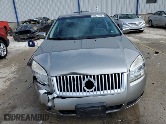 2009 Mercury Milan z VIN 3MEHM07Z89R627536, wystawiony jako Copart lot #55841295 z przebiegiem 75 774 mil mil oraz Szkoda całkowita • Salvage title. Historia ofert i sprzedaży dostępna na DreamBid. Obrazek 5.