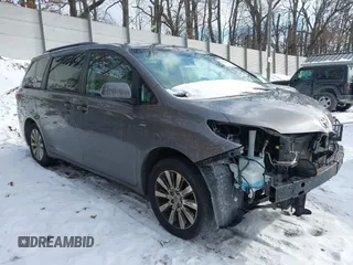 2017 Toyota Sienna LE with VIN 5TDJZ3DC5HS173134, listed as a IAAI auction lot 41256534 with 70,940 mi miles. Bid and sale history available at carsss.com. Image 1.