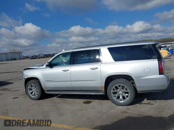 2015 GMC Yukon XL SLT z VIN 1GKS2HKCXFR618783, wystawiony jako IAAI lot #42081053 z przebiegiem 230 368 mil mil oraz . Historia ofert i sprzedaży dostępna na DreamBid. Obrazek 15.