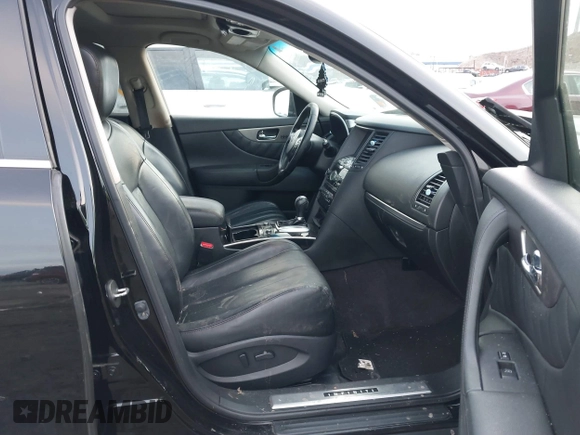 2015 Infiniti QX70 with VIN JN8CS1MW2FM480768, listed as a IAAI auction lot 41229824 with 149,146 mi miles and . Bid and sale history available at DreamBid. Image 5.