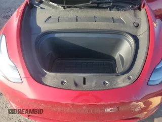2023 Tesla Model Y Performance with VIN 7SAYGDEF4PF960357, listed as a Copart auction lot 51126105 with 37,252 mi miles and Salvage Title. Bid and sale history available at DreamBid. Image 12.