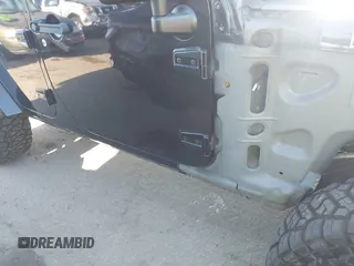 2017 Jeep Wrangler Unlimited Sahara with VIN 1C4BJWEG5HL635319, listed as a IAAI auction lot 42224748 with 141,214 mi miles and . Bid and sale history available at DreamBid. Image 19.