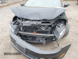 2014 Volkswagen Eos Komfort with VIN WVWBW8AH2EV001719, listed as a IAAI auction lot 42080290 with 105,661 mi miles and . Bid and sale history available at DreamBid. Image 6.