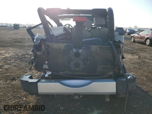 2010 Jeep Wrangler Sahara with VIN 1J4AA5D13AL139504, listed as a Copart auction lot 52746725 with Not provided miles and Salvage title. Bid and sale history available at DreamBid. Image 6.