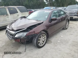 2012 Ford Fusion SEL с VIN 3FAHP0JA5CR184593, выставлен на аукционе Copart как лот 61647265 с пробегом 127 720 миль миль и Списание • Salvage title. История ставок и продаж доступна на DreamBid. Изображение 1.