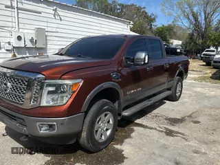 2016 Nissan Titan SL z VIN 1N6BA1F20GN510413, wystawiony jako Copart lot #48017425 z przebiegiem 225 717 mil mil oraz Czysty tytuł • Clean title. Historia ofert i sprzedaży dostępna na DreamBid. Obrazek 2.