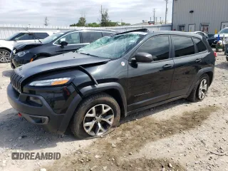 2015 Jeep Cherokee Trailhawk z VIN 1C4PJMBS2FW710847, wystawiony jako Copart lot #57101984 z przebiegiem 198 585 mil mil oraz Nie do naprawy • Non repairable. Historia ofert i sprzedaży dostępna na DreamBid. Obrazek 1.