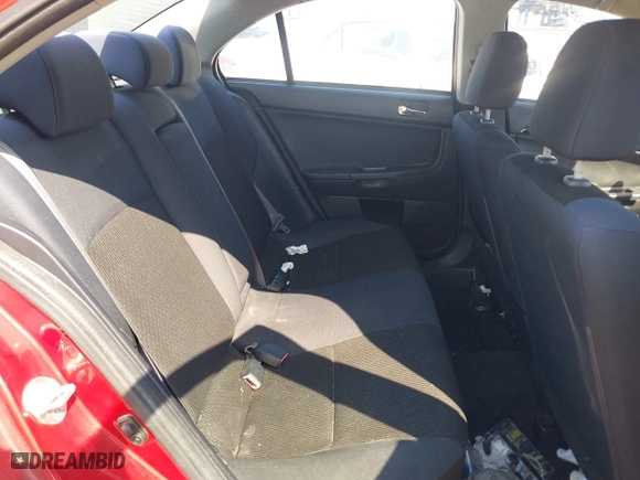 2016 Mitsubishi Lancer ES with VIN JA32U2FU6GU011198, listed as a IAAI auction lot 41932443 with 122,991 mi miles. Bid and sale history available at carsss.com. Image 8.