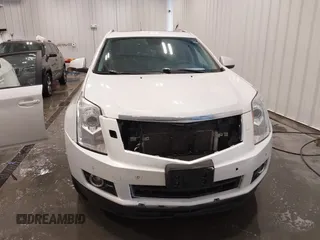 2012 Cadillac SRX Premium Collection z VIN 3GYFNFE38CS591123, wystawiony jako IAAI lot #41827636 z przebiegiem 143 867 mil mil oraz . Historia ofert i sprzedaży dostępna na DreamBid. Obrazek 13.