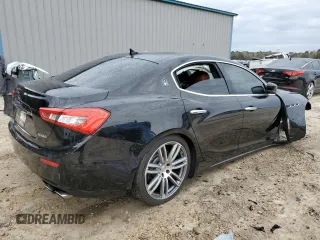 2015 Maserati Ghibli S Q4 with VIN ZAM57RTA8F1144369, listed as a Copart auction lot 77810033 with 82,749 mi miles. Bid and sale history available at carsss.com. Image 3.