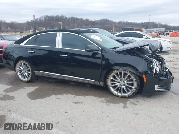 2013 Cadillac XTS Platinum z VIN 2G61V5S37D9194227, wystawiony jako IAAI lot #41510449 z przebiegiem 114 243 mil mil oraz . Historia ofert i sprzedaży dostępna na DreamBid. Obrazek 13.