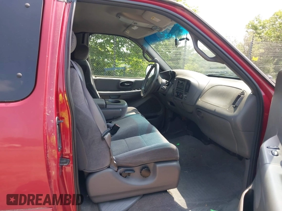 2002 Ford F-150 XL with VIN 1FTRX18L42NA99340, listed as a IAAI auction lot 42641912 with 98,195 mi miles and . Bid and sale history available at DreamBid. Image 5.