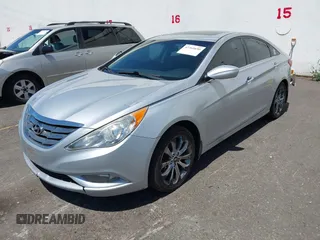 2012 Hyundai Sonata Limited z VIN 5NPEC4AC5CH370901, wystawiony jako IAAI lot #42369650 z przebiegiem 210 863 mil mil oraz . Historia ofert i sprzedaży dostępna na DreamBid. Obrazek 2.