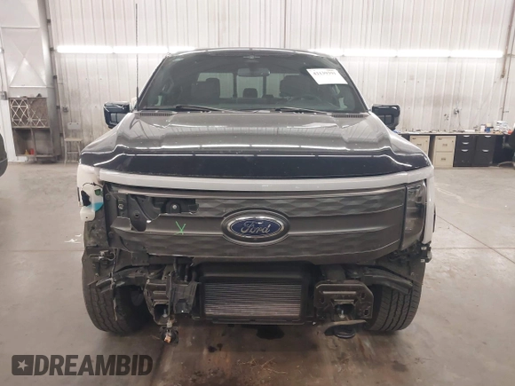 2023 Ford F-150 Lightning Pro with VIN 1FTVW1EL4PWG22900, listed as a IAAI auction lot 42139391 with 6,569 mi miles and . Bid and sale history available at DreamBid. Image 13.