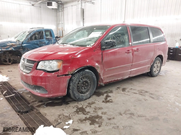 2012 Dodge Grand Caravan SE with VIN 2C4RDGBG7CR288009, listed as a IAAI auction lot 41557118 with 223,287 mi miles. Bid and sale history available at carsss.com. Image 2.