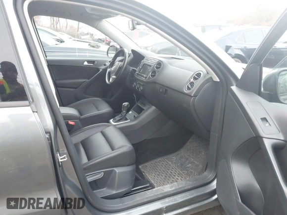 2017 Volkswagen Tiguan S with VIN WVGBV7AX5HK028788, listed as a IAAI auction lot 41699615 with 113,608 mi miles and . Bid and sale history available at DreamBid. Image 5.