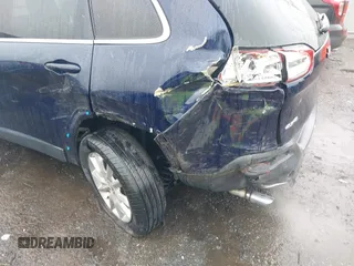 2014 Jeep Cherokee Limited with VIN 1C4PJMDS0EW277301, listed as a IAAI auction lot 42357034 with 61,825 mi miles and . Bid and sale history available at DreamBid. Image 6.